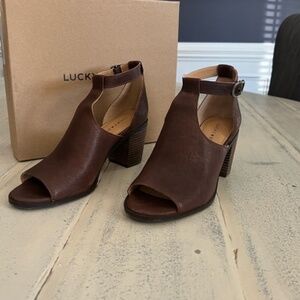 TWO PAIRS - Lucky sandals.  Brown and black.  $20 for both pairs.